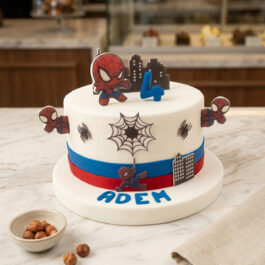 Gâteau d'anniversaire personnalisé thème Spiderman en pâte à sucre par Deluxe Pâtisserie